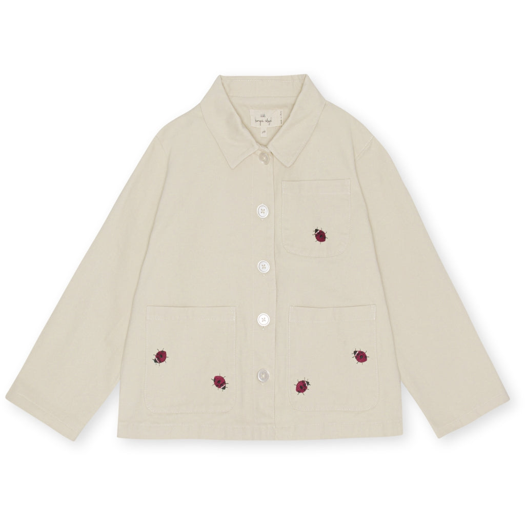 Giacca ecru con coccinelle ricamate