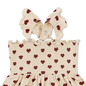 Dress with crossed straps / heart pattern