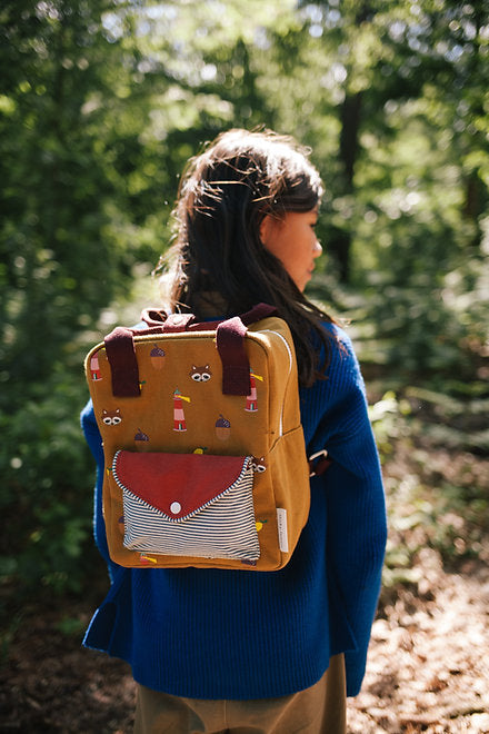 Multi-pocket backpack with acorns and foxes pattern