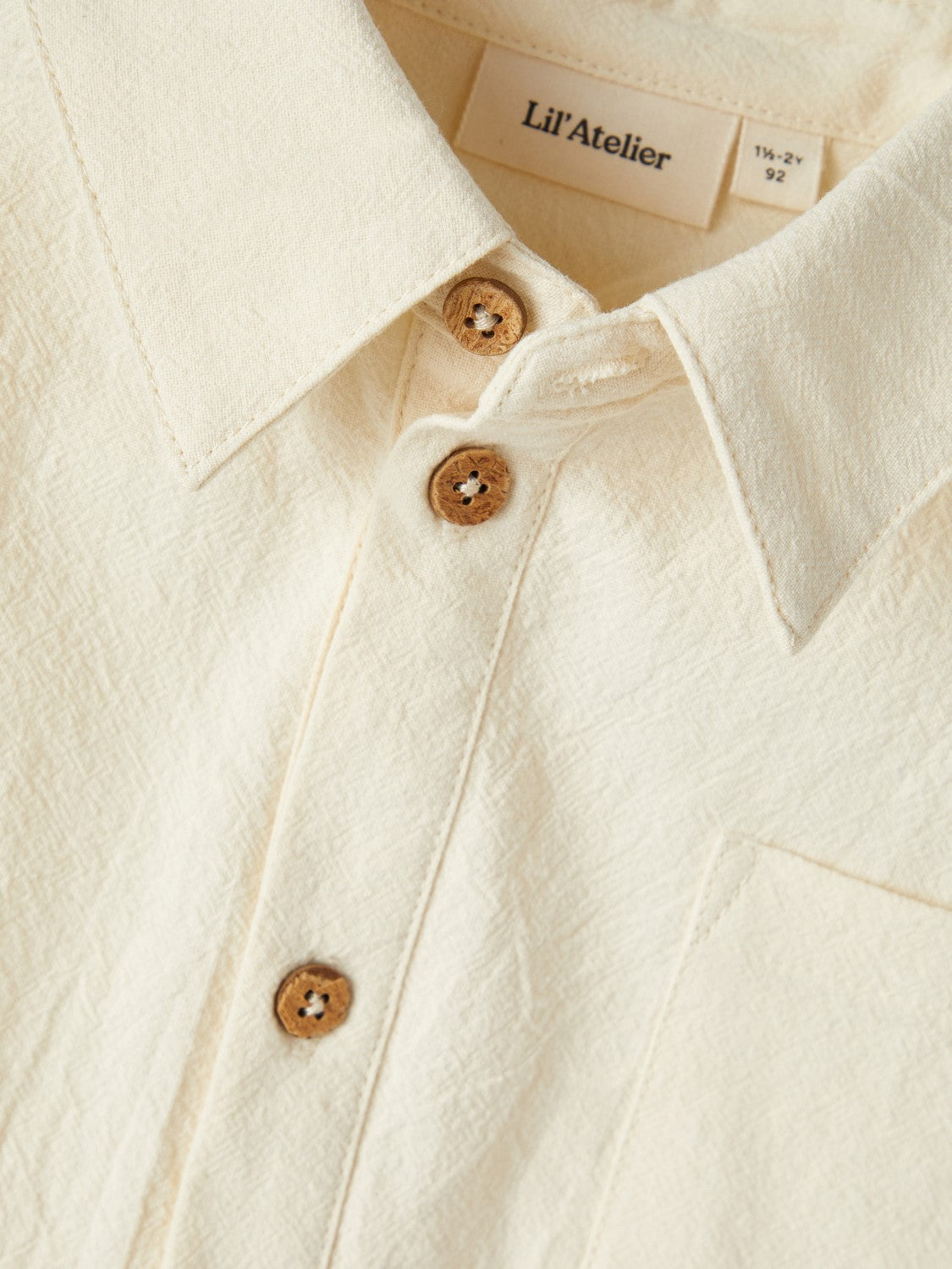 Short-sleeved ecru shirt with pocket